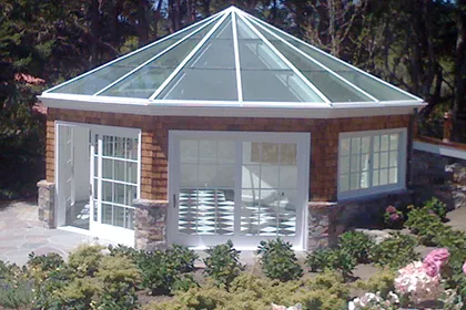 Royalite fabricated this octagon solarium with a pyramid glass roof making it the perfect addition to the garden