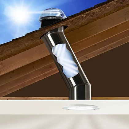 Atic detail showing Solatube Daylighting Device installed between ceiling and roof