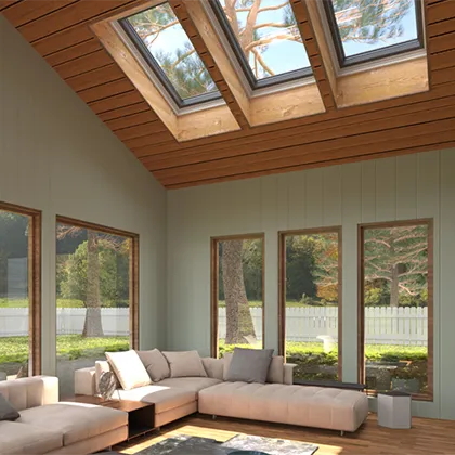 Living room filled with light and views is complemented by the natural wood pitched ceiling and three VELUX Skylights