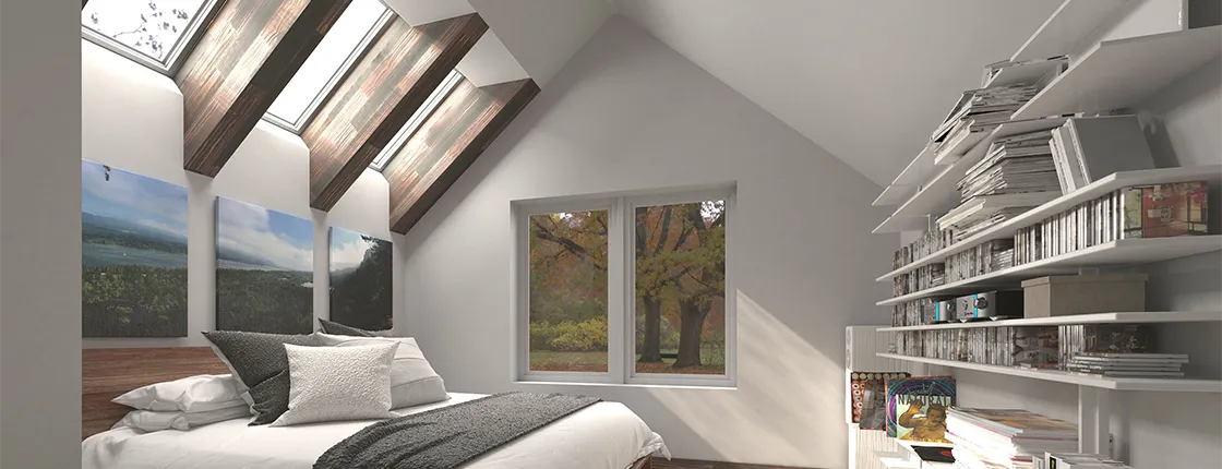 Three VELUX skylights provide additional natural daylight and views of the night sky in this remodeled bedroom.
