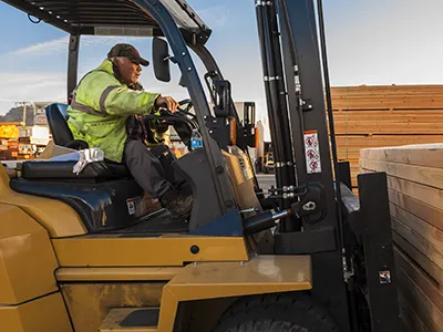 South City Lumber & Supply forklift driver with a load of Douglas Fir 4x6