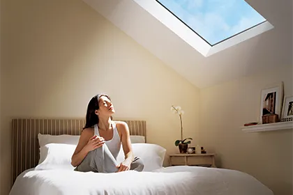 Velux energy efficient skylight brightens a dark bedroom